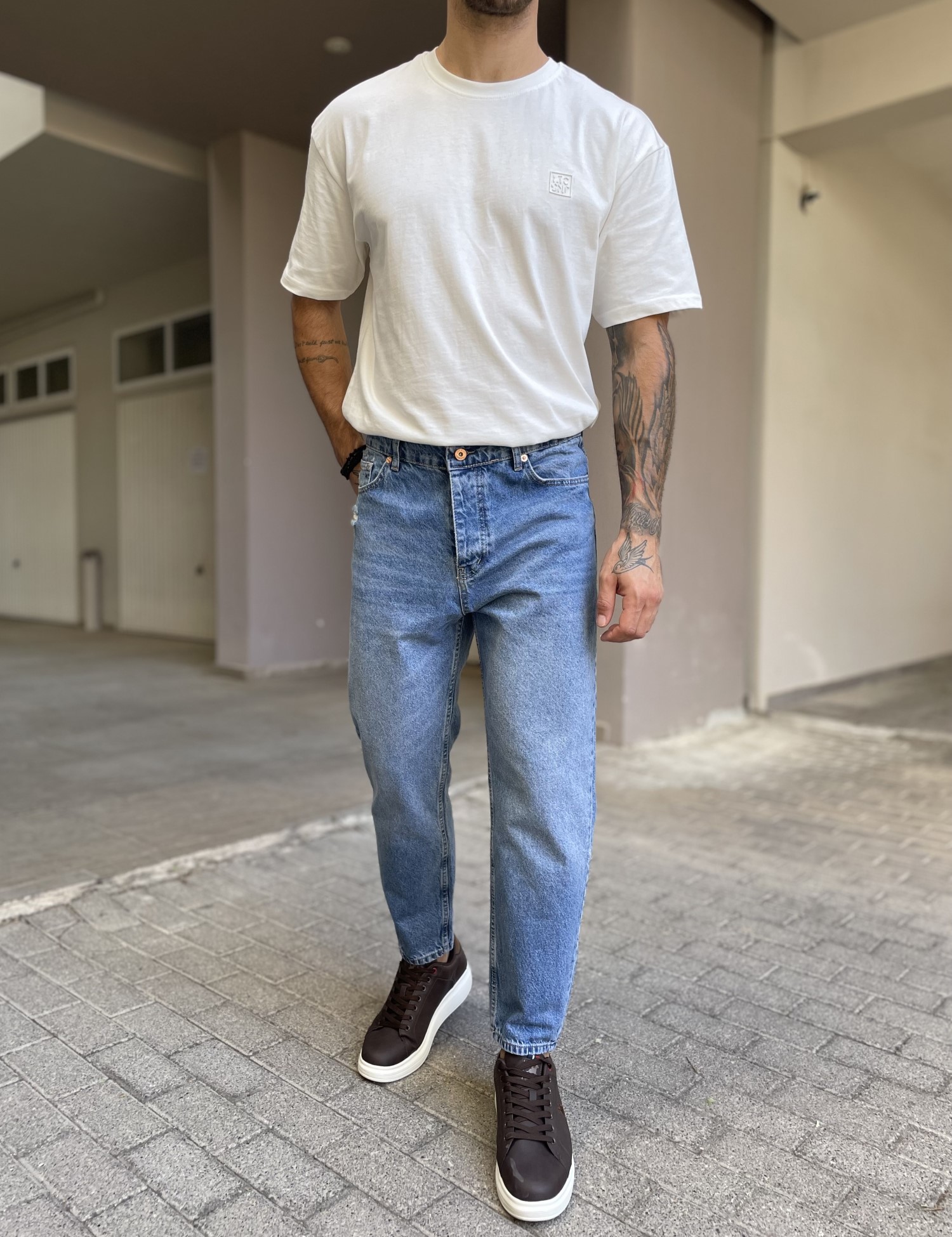 Ανδρικό μπλε ανοικτό loose τζιν πεντάτσεπο με φθορές WE2909 φωτογραφία